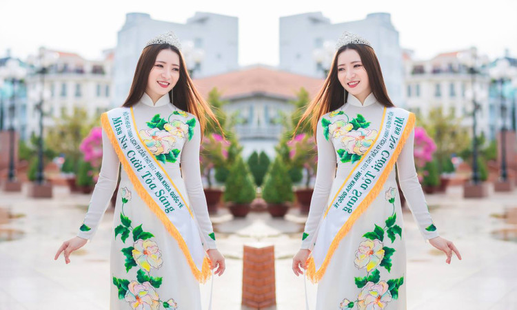 Model Nguyễn Nhật Thảo đẹp tinh khôi thả dáng với áo dài trắng trên phố đón xuân